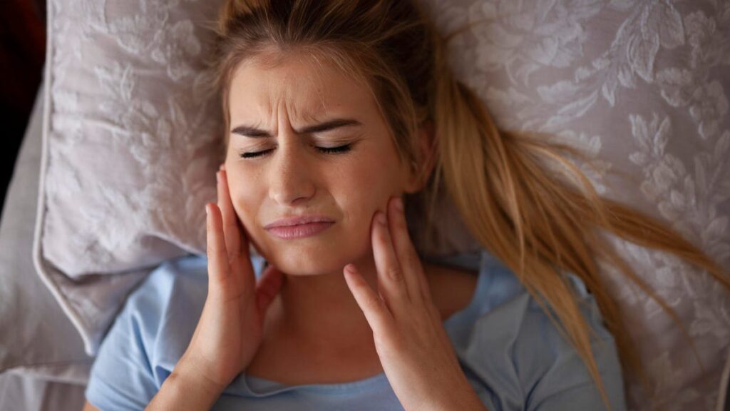 Teeth grinding in sleep Heres how to stop it naturally