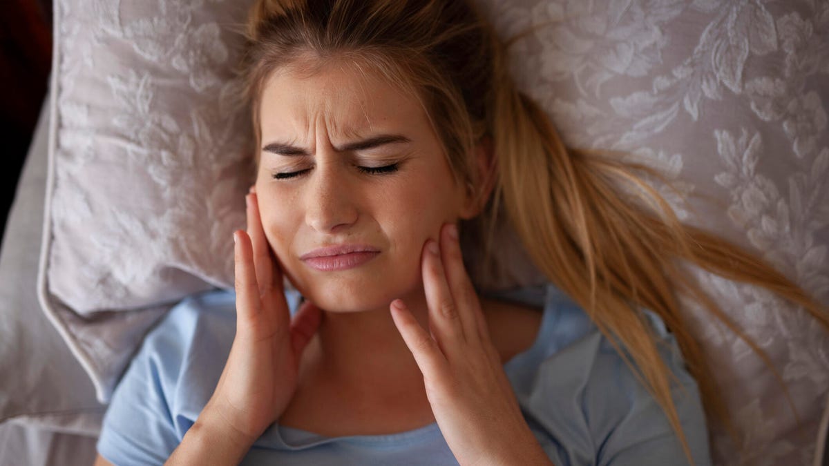 Teeth grinding in sleep Heres how to stop it naturally