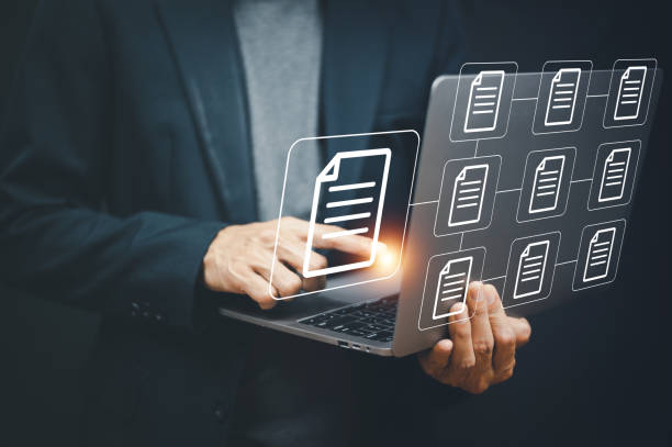 businessman using computer document management system online