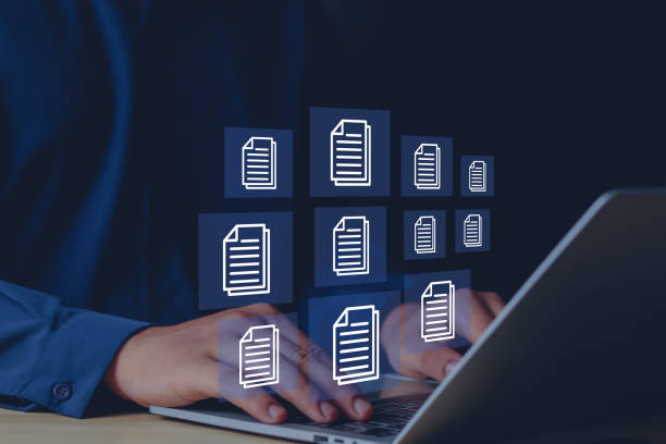 businessman working on laptop computer documents managing fi