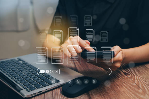 job search process with digital documents and laptop on wood