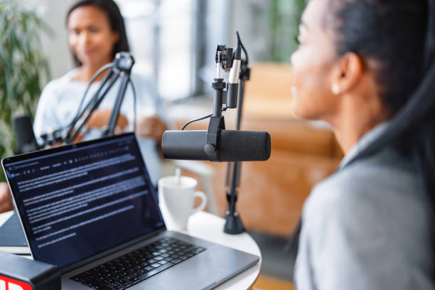 diverse executive team in live podcast recording1959997910